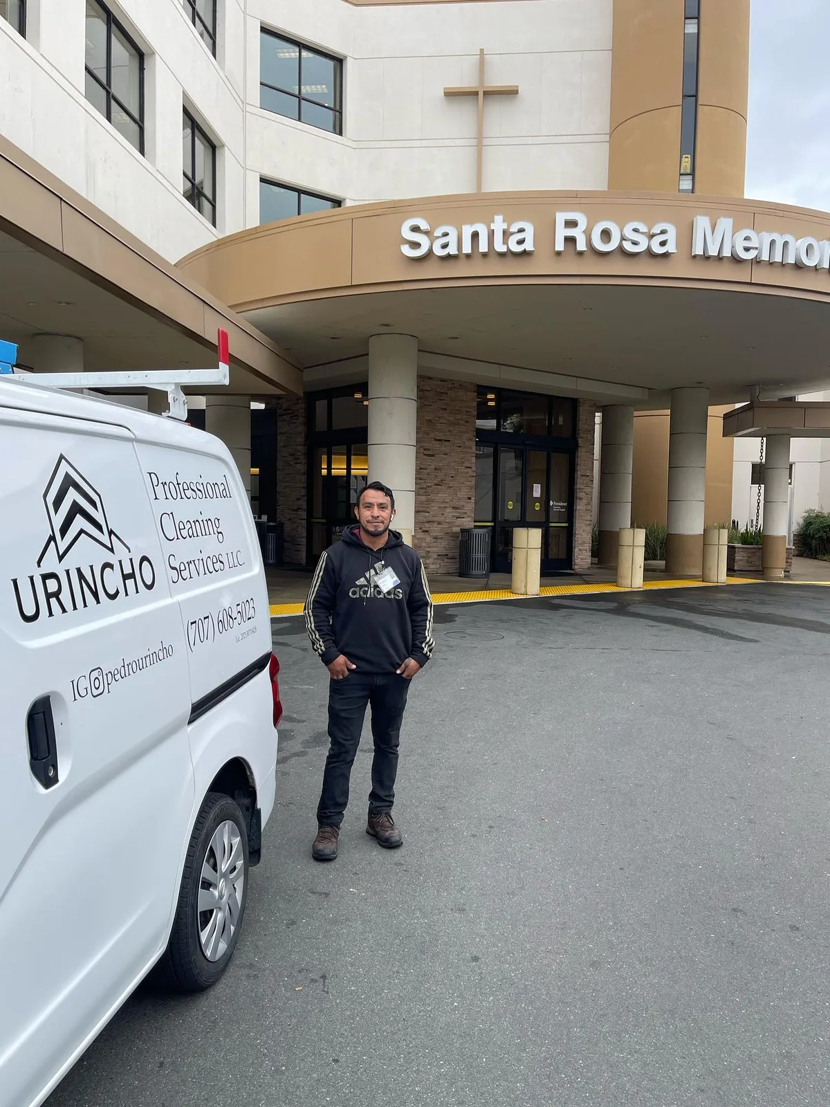 Cleaning company van at a hospital main entrance